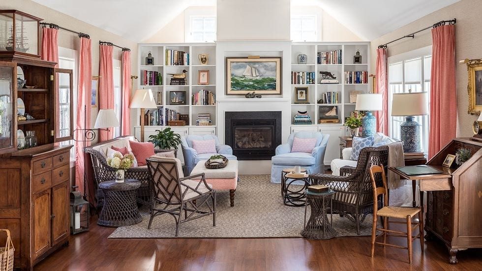 Grandmillennial living room from The Glam Pad with wicker chairs & drapes