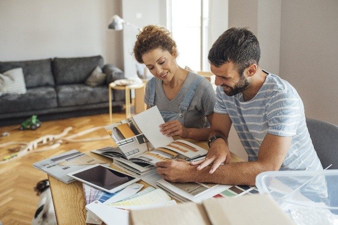 Couple putting together furniture 2