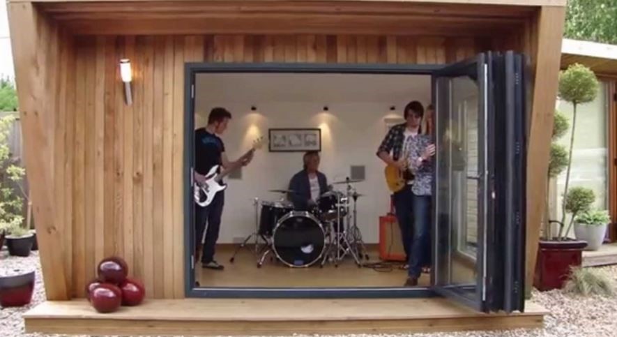 Band practicing in a sound proof shed