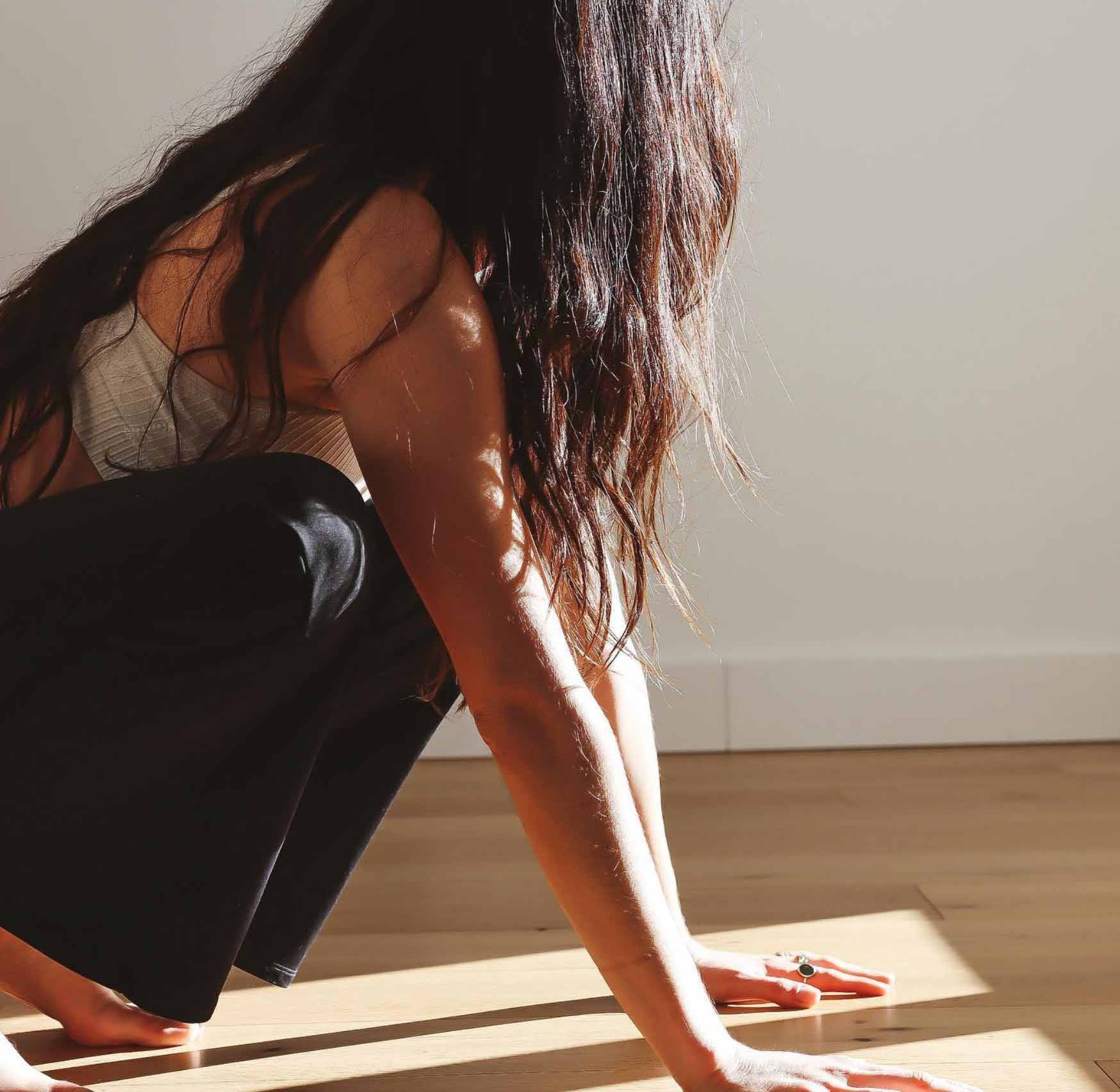 Person practicing yoga