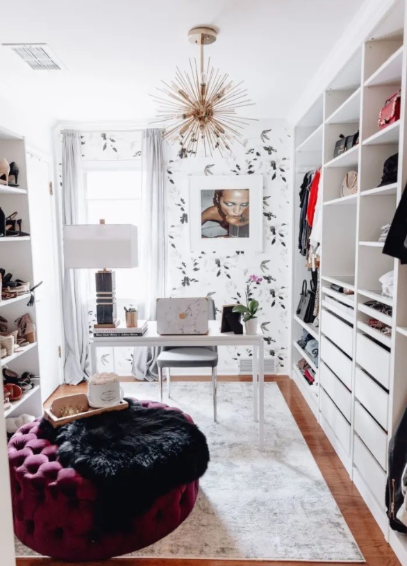 Spacious walk-in closet with an office
